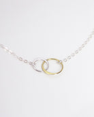 Mixed Metal Infinity Necklace With Interlocking Circles