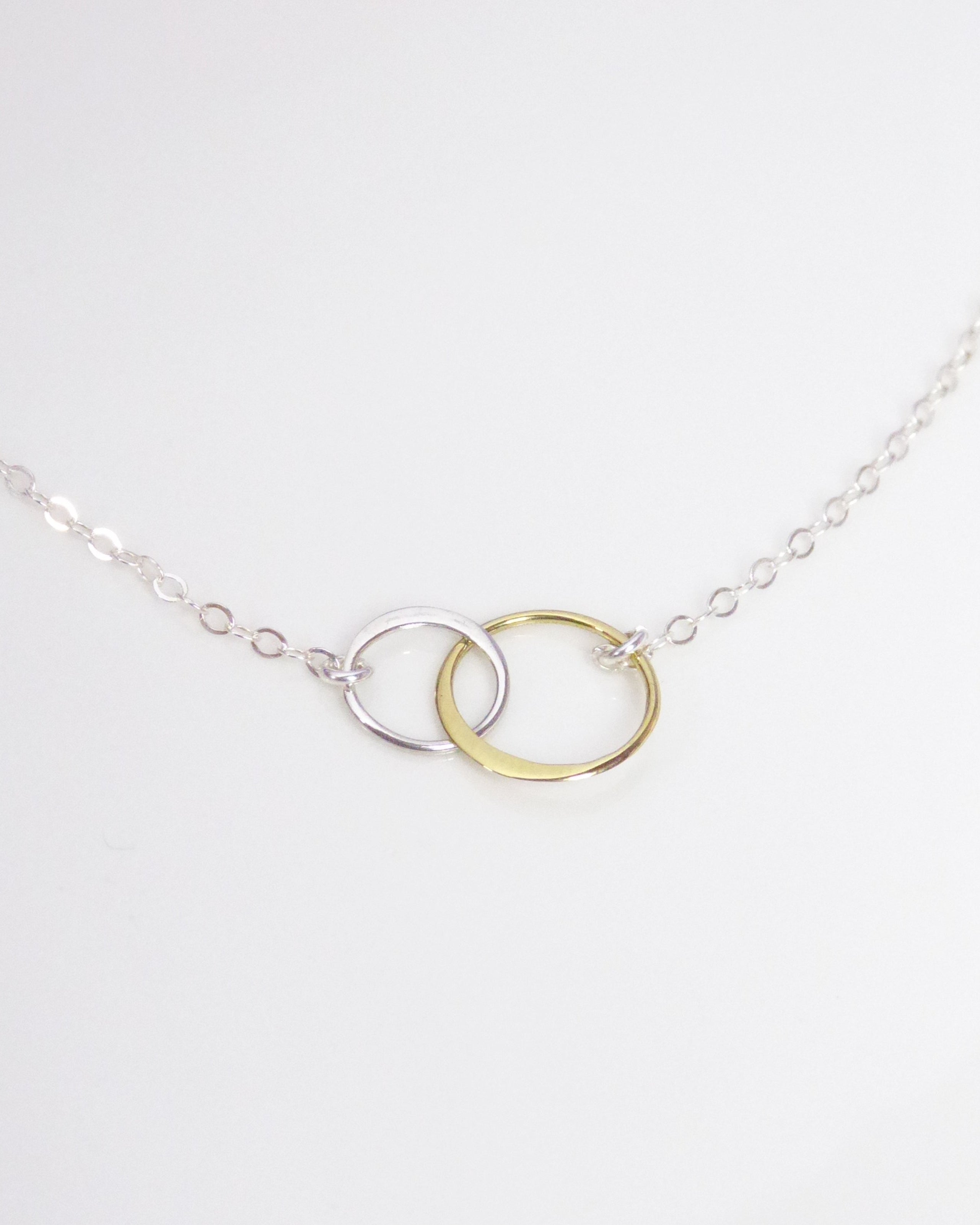 Mixed Metal Infinity Necklace With Interlocking Circles