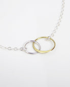 Mixed Metal Infinity Necklace With Interlocking Circles