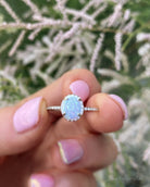 Sterling Silver White Opal Ring Encrusted with Cubic Zirconia