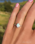 Sterling Silver White Opal Ring Encrusted with Cubic Zirconia